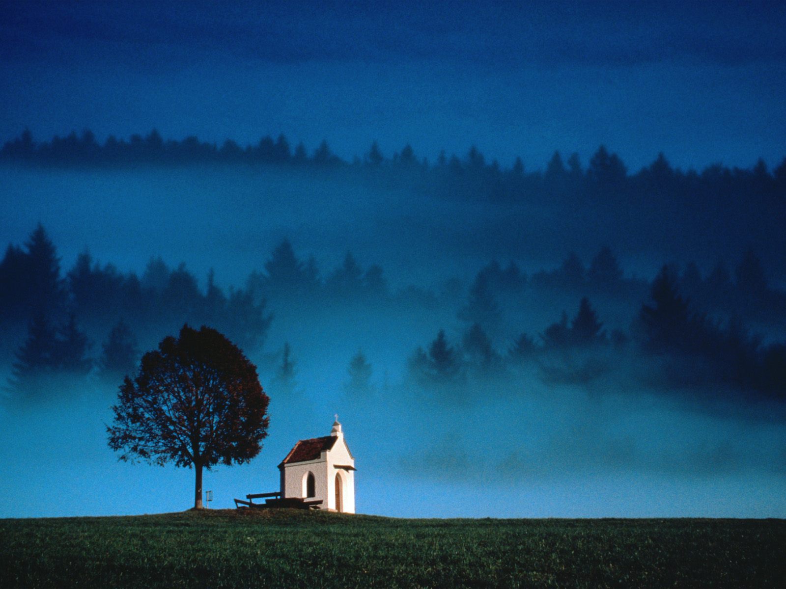 Tiny Church Overlooking Misty Valley Germany